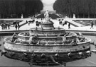 Water feature in the gardens of the palace of Versailles.Very busy water feature when on, I love the turtle and frog spouts.
